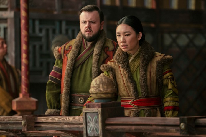 3BodyProblem-Netflix-John-Jess John Bradley as Jack Rooney and Jess Hong as Jin Cheng standing at a balcony and looking out in 3 Body Problem.