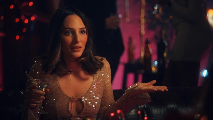 Maeva D'Ascanio on Made in Chelsea Maeva D'Ascanio in a sparkly dress with her hand out.