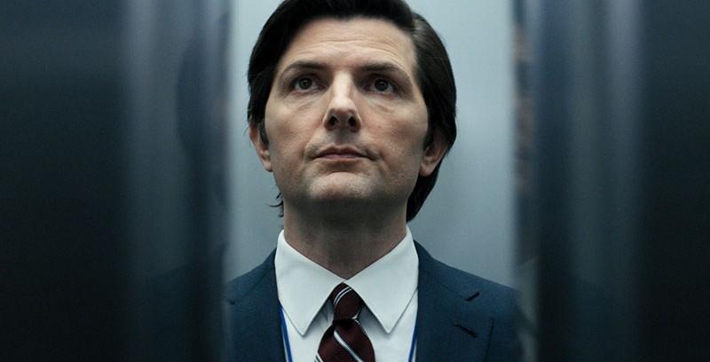 Severance Adam Scott as Mark in Severance entering an elevator