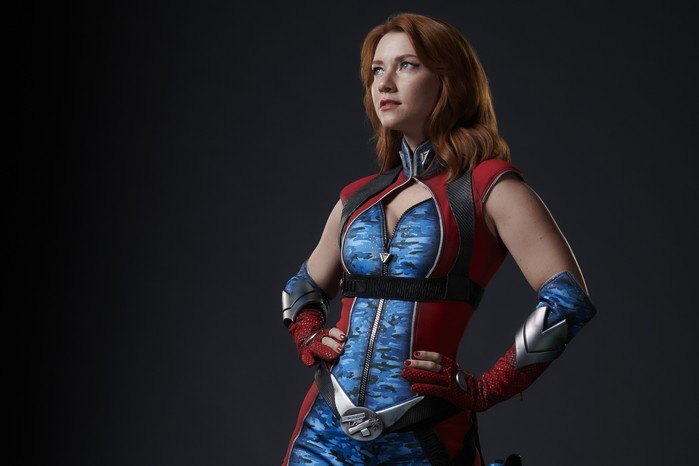 Valorie Curry as Firecracker in The Boys season 4 Valorie Curry as Firecracker in The Boys season 4, posing with her hands on her hips