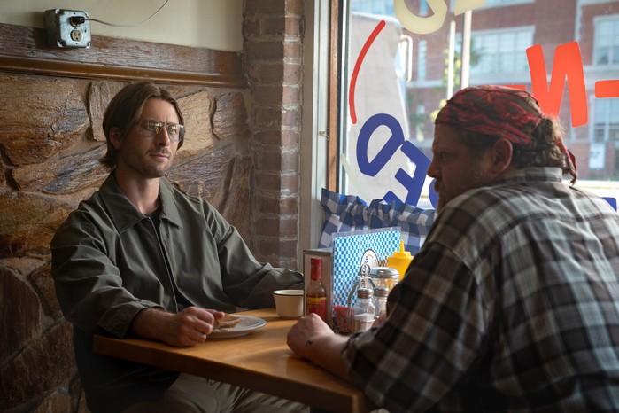 Glen Powell as Gary Johnson and Bryant Carroll as Walt in Hit Man. Glen Powell as Gary Johnson and Bryant Carroll as Walt in Hit Man.