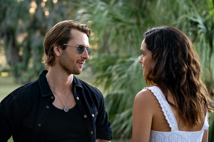 Glen Powell as Gary Johnson and Adria Arjona as Madison in Hit Man. Glen Powell as Gary Johnson and Adria Arjona as Madison in Hit Man.