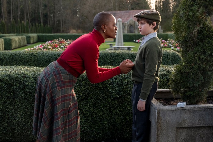 T'Nia Miller as Hannah Grose and Benjamin Evan Ainsworth as Miles in The Haunting of Bly Manor T'Nia Miller as Hannah Grose and Benjamin Evan Ainsworth as Miles in The Haunting of Bly Manor with Grose holding Miles's hand in a country garden