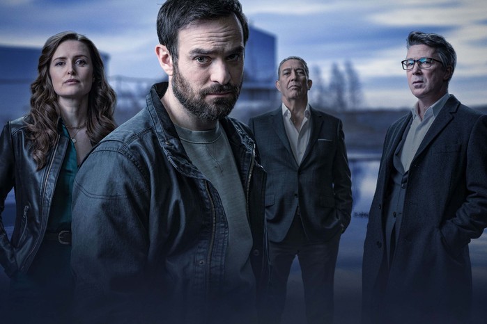 kin-charlie-cox The cast of Kin stand in a line staring into camera
