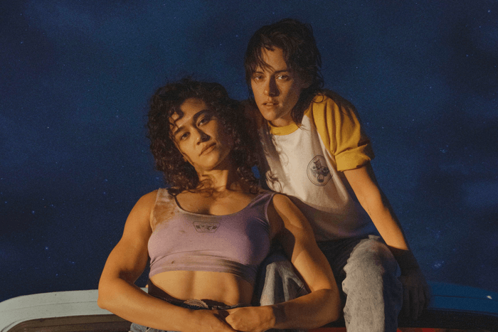 Love Lies Bleeding film Katy O'Brian and Kristen Stewart on a truck in Love Lies Bleeding.